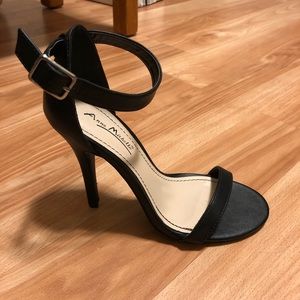 Brand new strappy black heels